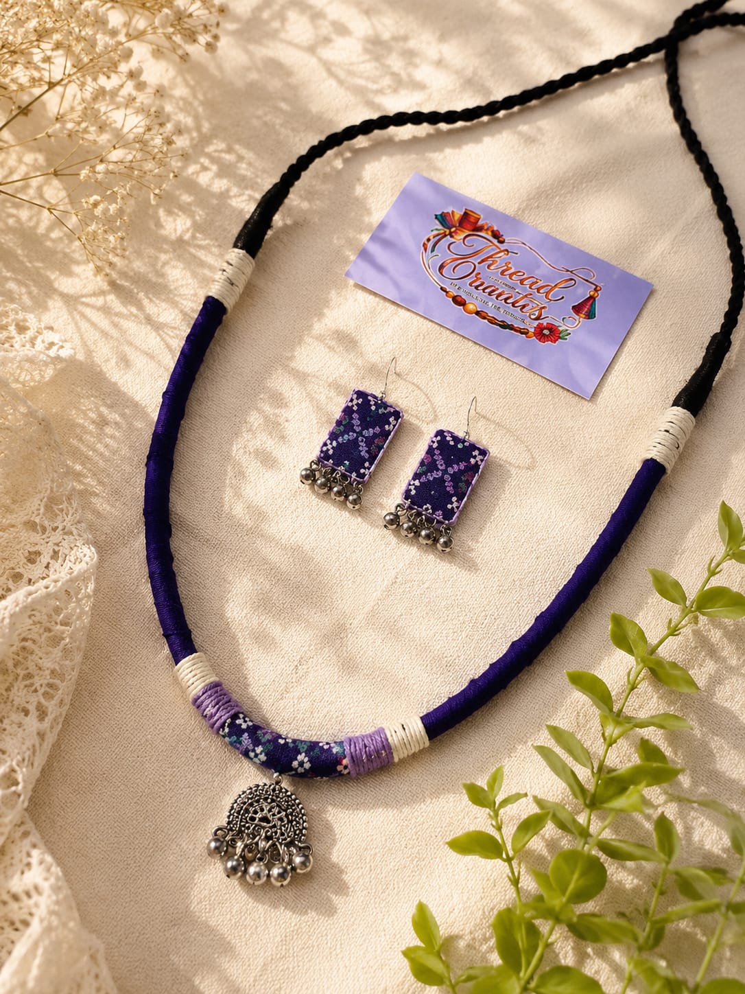 ROYAL BLUE DRAPED CHARMS NECKLACE
