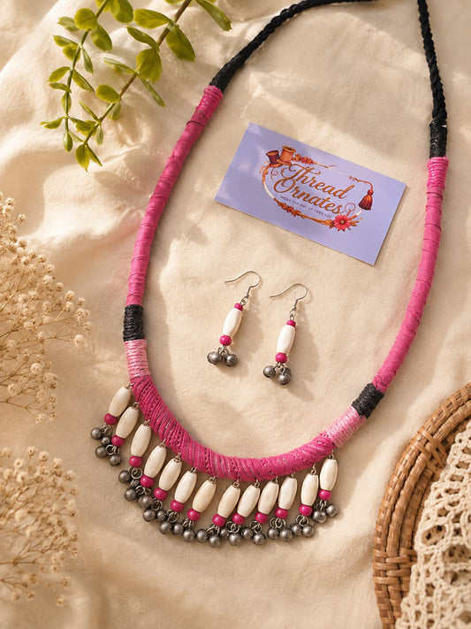 BLUSH PINK DRAPED CHARMS  NECKLACE