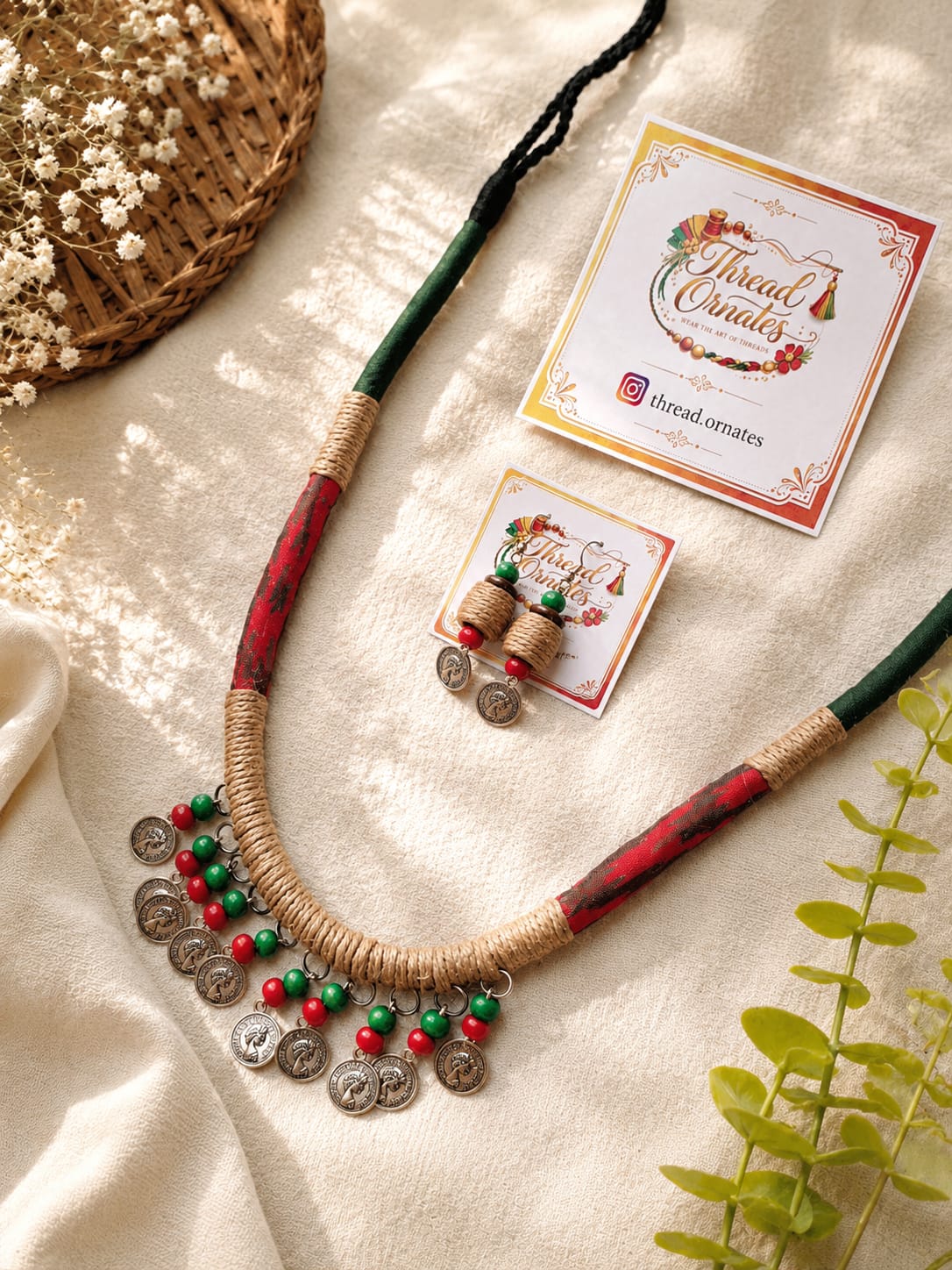 EMERALD GREEN DRAPED CHARMS NECKLACE